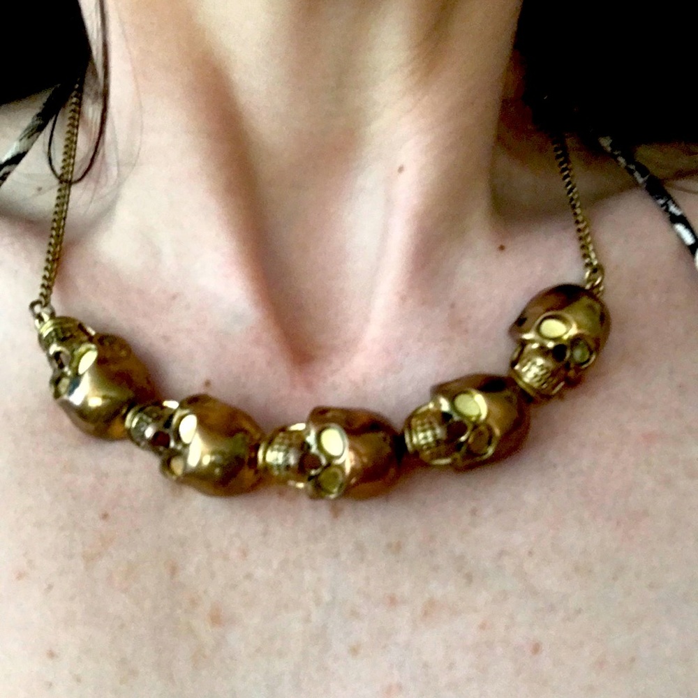 Golden bronze skull necklace. Rare